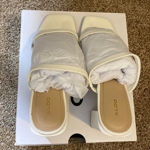 White chunky heels block heels